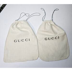 Gucci Cream Fabric Shoe Bags. Some stains. Each shoes per bag. See pics.